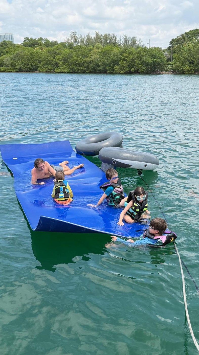 Kids on the float mat