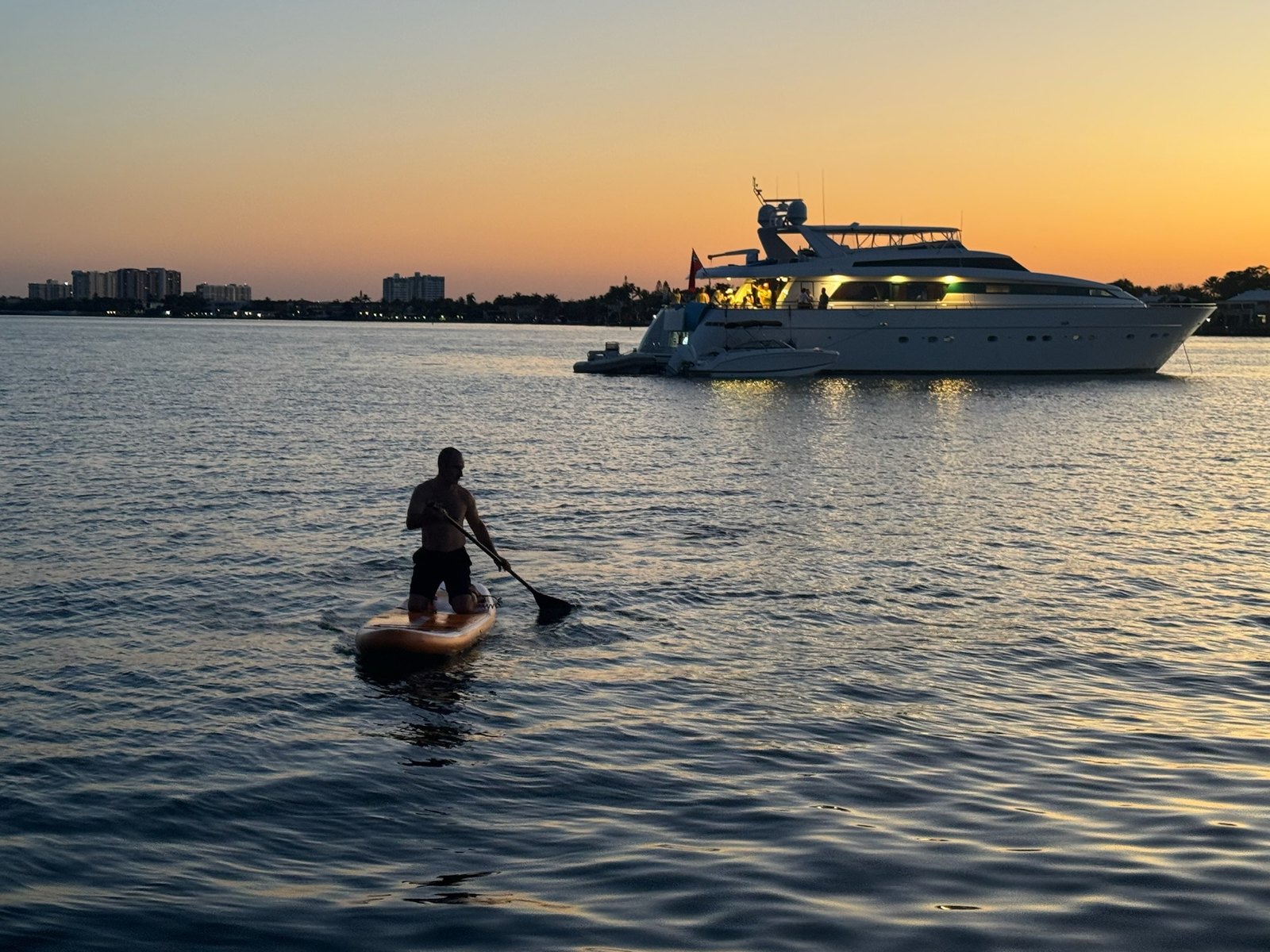 Paddleboarding at sunset